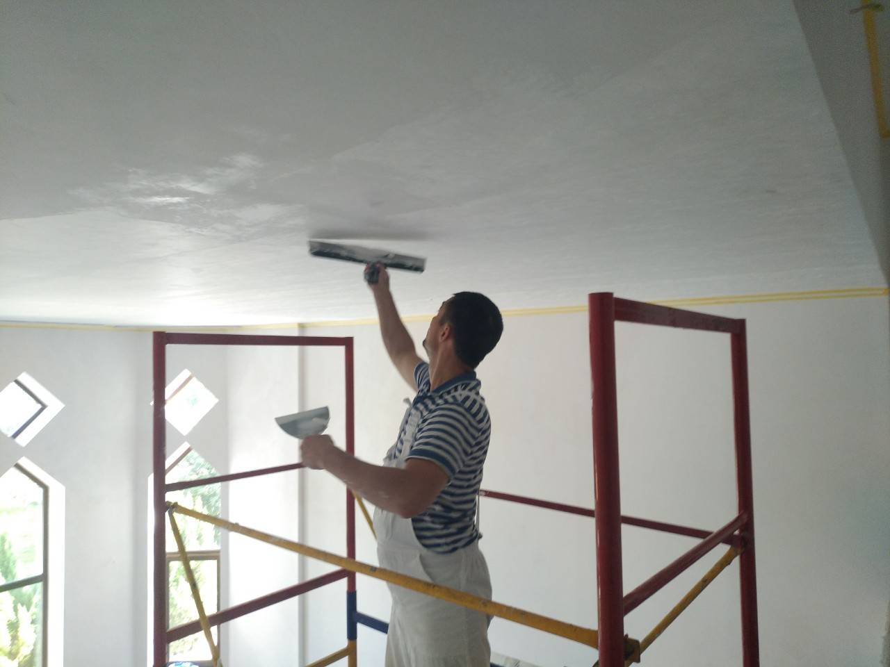 Процесс подготовки и покраски стен из гипсокартона