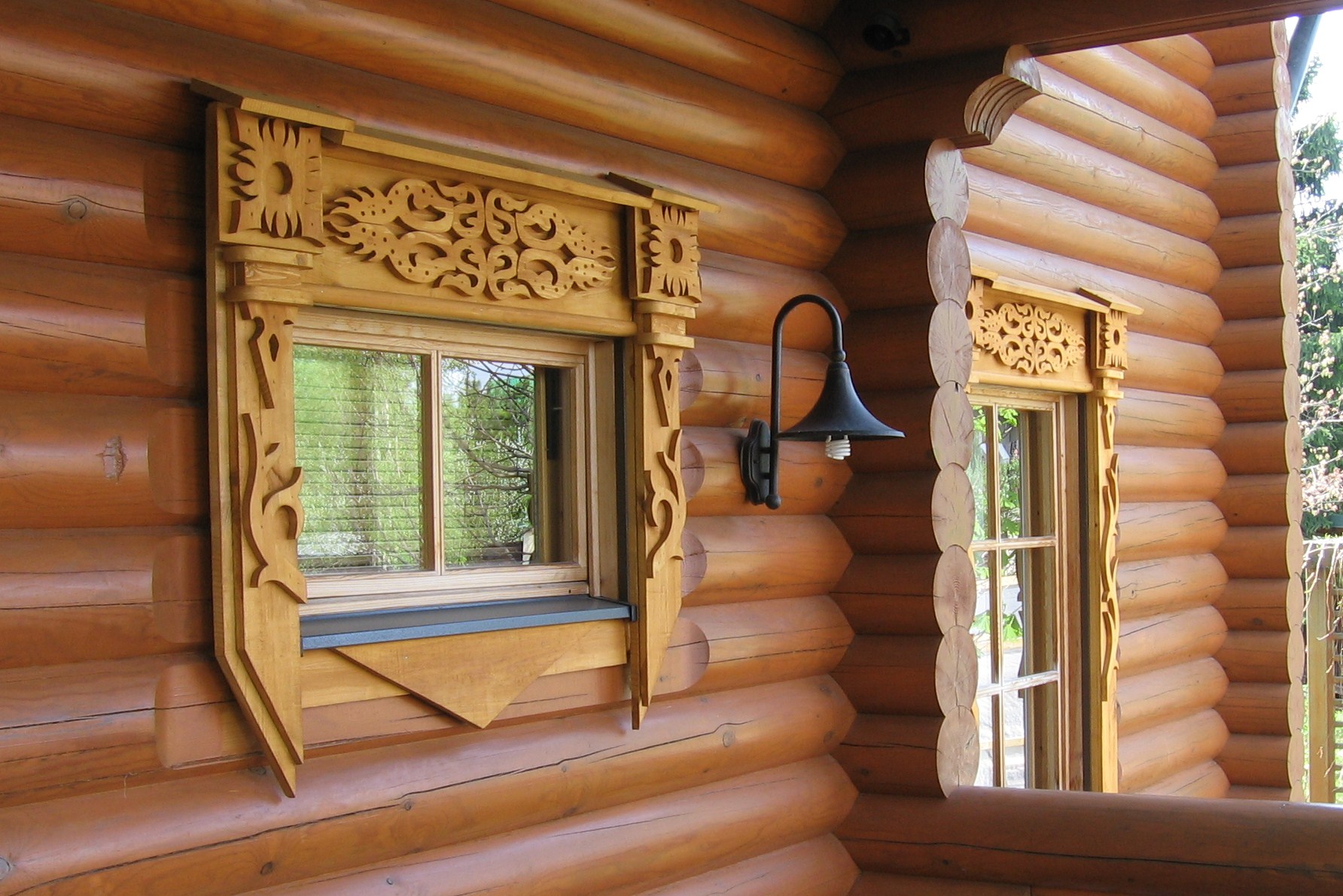 Наличники на окна в деревянном доме: их виды на 30 фото
