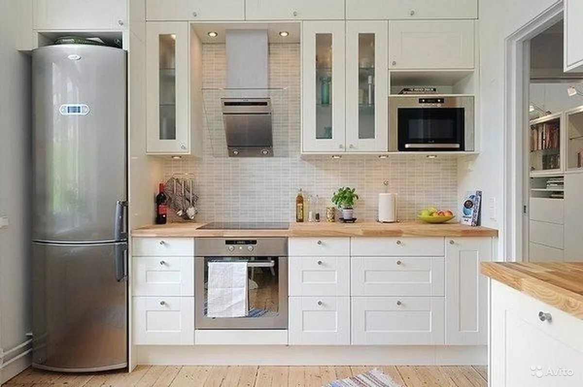 Встроенный холодильник в кухонный гарнитур: фото, варианты удачного размещения