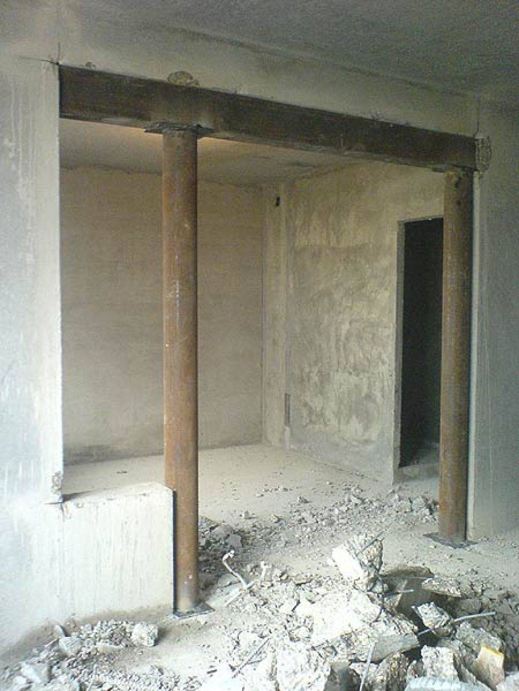 Демонтаж бетонных, кирпичных и несущих стен между кухней и комнатой в панельном доме