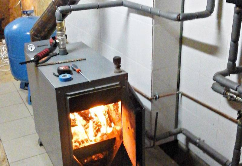 Выбираем дровяной котел длительного горения для отопления дома